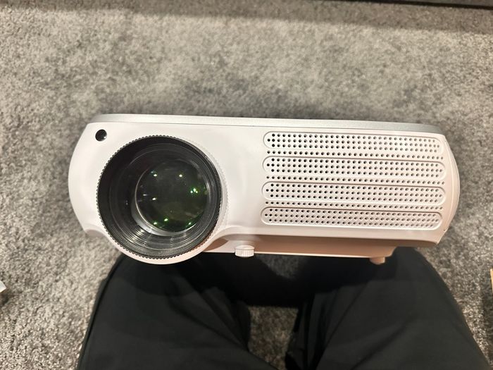 Tiptop Home Projector like ne condition comes with all accessories and a 100" cloth projector screen.