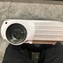 Tiptop Home Projector like ne condition comes with all accessories and a 100" cloth projector screen. Image 2