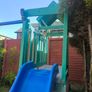 Childrens kids Outdoor Playset. Swings, Slide, Playhouse & Storage Image 4