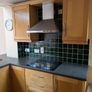 Entire Kitchen including Neff Double Oven, Integrated Fridge-Freezer, Bosch Dishwasher,  Faber Extractor fan, and Microwave. Image 2