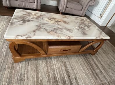 Wooden coffee table with marble patterned resin top