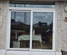 Fairco sliding door and transom window