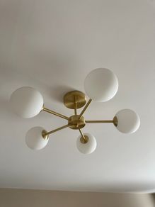 Modern 5-light brass and frosted glass ceiling fitting