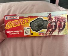 Lone star cowboy toy gun