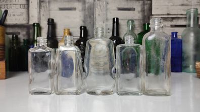309 - Set of 5 Vintage Decorative Similar Size Collectible Clear Glass Bottles