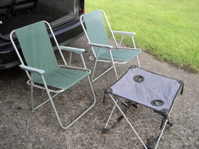 Deck chairs and folding table .
