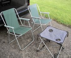 Deck chairs and folding table .