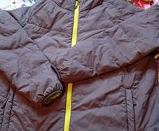Padded jacket NEW and carrier pouch