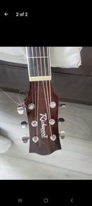 acoustic guitar and tuner
