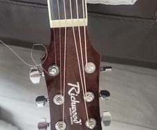 acoustic guitar and tuner