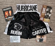 Rubin 'Hurricane' Carter signed boxing trunks. Comes with COA, photo & FREE Denzel Washington DVD AND the book that inspired the movie!