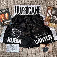 Rubin 'Hurricane' Carter signed boxing trunks. Comes with COA, photo & FREE Denzel Washington DVD AND the book that inspired the movie!