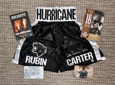 Rubin 'Hurricane' Carter signed boxing trunks. Comes with COA, photo & FREE Denzel Washington DVD AND the book that inspired the movie!
