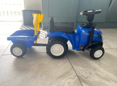 Ride on new Holland with trailer 12-36 months