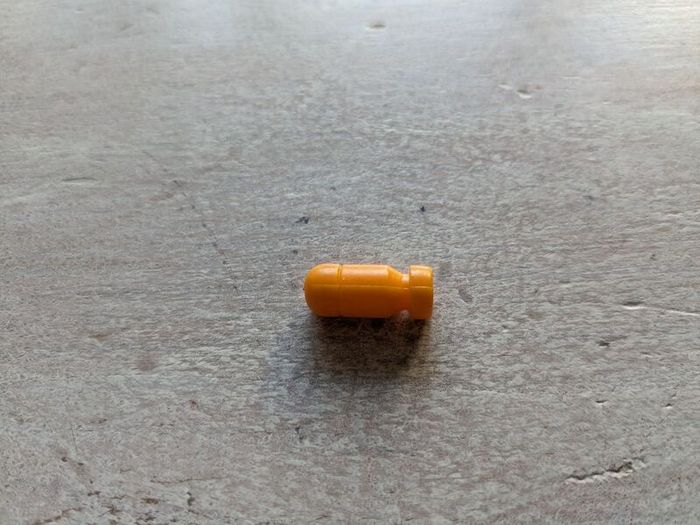 one bullet from Takara Browning M1910 Gun Robo Microman MC-07