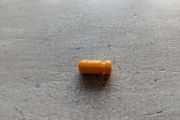 one bullet from Takara Browning M1910 Gun Robo Microman MC-07