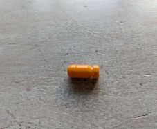 one bullet from Takara Browning M1910 Gun Robo Microman MC-07