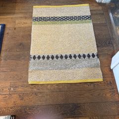 70 by 100 cm polyester rug woven textured finish