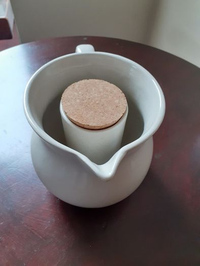 Pottery Pitcher with Ice Section