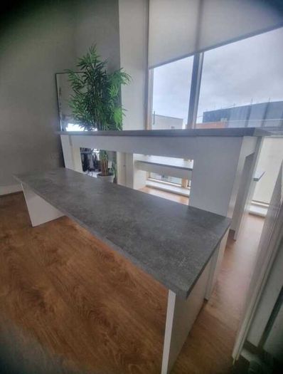 White and grey kitchen table with benches