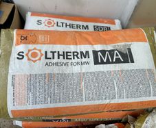 Adhesive for bonding mineral wool