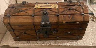 Antique  a wooden money  chest , having brass escutcheon and black metal hinges. 20cm x10