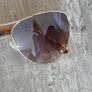 Lovely ELLE sunglasses with brown lenses, gold-tone frame and brown arms. Model WEL71SG03. Pre-owned condition, please see photos for details. Image 9