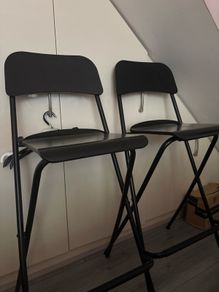 Four black Ikea high stools
