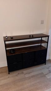 Industrial style storage unit with 6 fabric drawers and 3 open shelves.