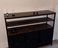 Industrial style storage unit with 6 fabric drawers and 3 open shelves.