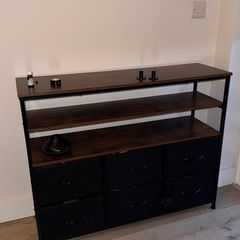 Industrial style storage unit with 6 fabric drawers and 3 open shelves.