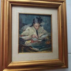 Oil painting of a girl reading at a desk