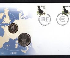 2002 Ireland Punt and Euro Philatelic Numismatic Cover (PNC) with IR1 coin and E1 coin tied with 30p & 38c blackbird definitive stamps