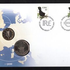 2002 Ireland Punt and Euro Philatelic Numismatic Cover (PNC) with IR1 coin and E1 coin tied with 30p & 38c blackbird definitive stamps