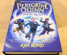 Peregrine Quinn and the Cosmic Realm hardback book