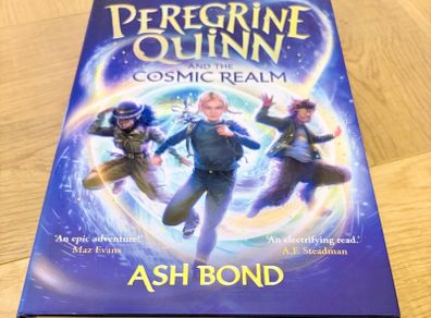 Peregrine Quinn and the Cosmic Realm hardback book