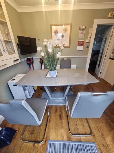 grey glass top dining table (Extendable