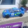 R/C Subaru car for parts + 2 controls Image 9