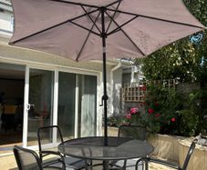 4 Seater Alexander Rose Patio dining table and parasol with base