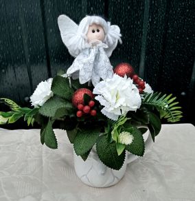 Christmas angel floral arrangement in white jug