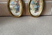 Vintage Pair Wall oval Brass frames features a young girl holding flowers