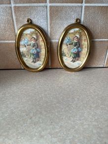 Vintage Pair Wall oval Brass frames features a young girl holding flowers