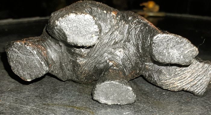 Small heavy rhino figurine