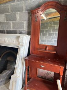 wooden cabinet and mirror