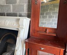 wooden cabinet and mirror