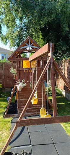 Garden playhouse slide swing