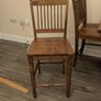 Wooden dining table with tiled top and matching chairs Image 2