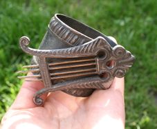 Antique napkin ring with harp