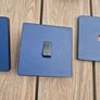 Navy blue socket and light switch Image 2