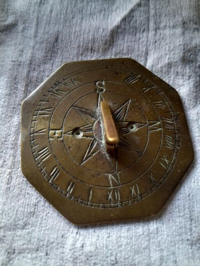 old miniature sundial